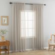 Dette produkt hedder Ellinor, fremstillet af Polyester materiale med en smuk Linned farve - SE Mattor