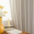 Dette produkt hedder Ellinor, fremstillet af Polyester materiale med en smuk Linned farve - SE Mattor