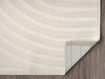 Dette produkt hedder Bella Zen, fremstillet af Polyester & Polypropylen materiale med en smuk Offwhite farve - SE Mattor