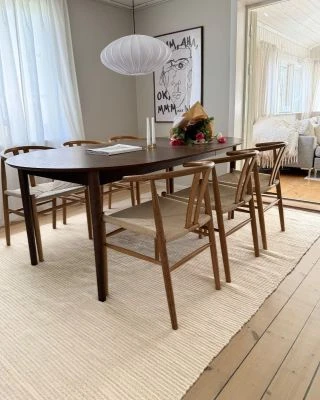 Dette produkt hedder Molly, fremstillet af 80% Uld & 20% Bomuld  materiale med en smuk Offwhite farve - SE Mattor