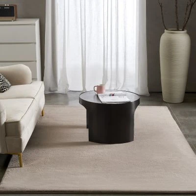 Dette produkt hedder Rabbit Eco, fremstillet af Polyester materiale med en smuk Taupe farve - SE Mattor