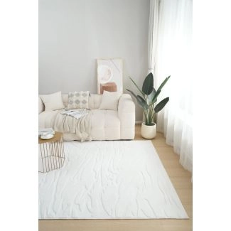 Dette produkt hedder Rabbit Nest, fremstillet af Polyester materiale med en smuk Offwhite farve - SE Mattor