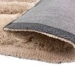 Dette produkt hedder Moody Bow, fremstillet af Polyester materiale med en smuk Beige farve - SE Mattor