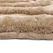 Dette produkt hedder Moody Bow, fremstillet af Polyester materiale med en smuk Beige farve - SE Mattor
