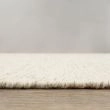Dette produkt hedder Norrsken, fremstillet af 60 % Uld & 40% Bomuld  materiale med en smuk Fløde farve - SE Mattor