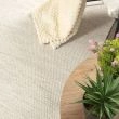 Dette produkt hedder Norrsken, fremstillet af 60 % Uld & 40% Bomuld  materiale med en smuk Fløde farve - SE Mattor