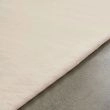 Dette produkt hedder Rabbit Eco, fremstillet af Polyester materiale med en smuk Offwhite farve - SE Mattor