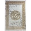 Dette produkt hedder Wico Versace Face, fremstillet af Polyester & Polypropylen materiale med en smuk Guld farve - SE Mattor