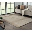 Dette produkt hedder Bella Spin, fremstillet af Polyester & Polypropylen materiale med en smuk Mørk Beige farve - SE Mattor