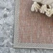 Dette produkt hedder Echo Station, fremstillet af Polypropylen materiale med en smuk Terra farve - SE Mattor