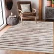 Dette produkt hedder Hiro Lalo, fremstillet af Polypropylen materiale med en smuk Beige farve - SE Mattor