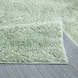 Dette produkt hedder Lazy, fremstillet af Polypropylen materiale med en smuk Grøn farve - SE Mattor