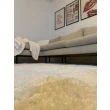 Dette produkt hedder Lazy, fremstillet af Polypropylen materiale med en smuk Offwhite farve - SE Mattor