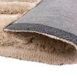 Dette produkt hedder Moody Bow, fremstillet af Polyester materiale med en smuk Beige farve - SE Mattor
