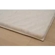 Dette produkt hedder Rabbit Lux, fremstillet af Polyester materiale med en smuk Lys Beige farve - SE Mattor