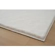 Dette produkt hedder Rabbit Lux, fremstillet af Polyester materiale med en smuk Offwhite farve - SE Mattor