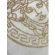 Dette produkt hedder Wico Versace Face, fremstillet af Polyester & Polypropylen materiale med en smuk Guld farve - SE Mattor
