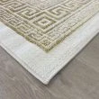 Dette produkt hedder Wico Versace Face, fremstillet af Polyester & Polypropylen materiale med en smuk Guld farve - SE Mattor