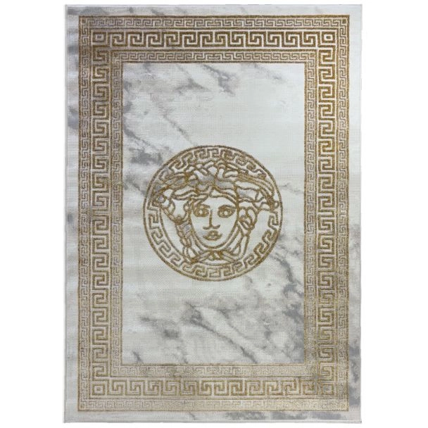 Dette produkt hedder Wico Versace Face, fremstillet af Polyester & Polypropylen materiale med en smuk Guld farve - SE Mattor