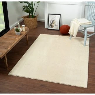 Dette produkt hedder Cloudy, fremstillet af Polyester materiale med en smuk Lys Beige farve - SE Mattor