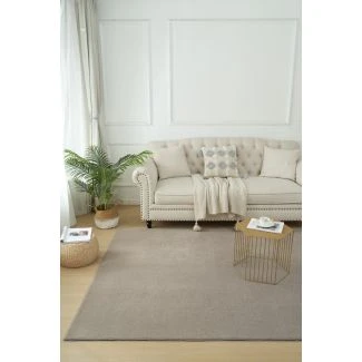 Dette produkt hedder Comfy, fremstillet af Polyester materiale med en smuk Gråbeige farve - SE Mattor