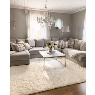 Dette produkt hedder Furry, fremstillet af Polypropylen materiale med en smuk Offwhite farve - SE Mattor