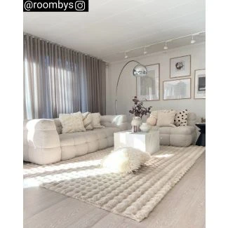 Dette produkt hedder Rabbit Bubble, fremstillet af Polyester materiale med en smuk Lys Beige farve - SE Mattor