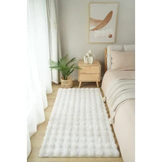 Dette produkt hedder Rabbit Bubble, fremstillet af Polyester materiale med en smuk Offwhite farve - SE Mattor