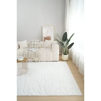 Dette produkt hedder Rabbit Nest, fremstillet af Polyester materiale med en smuk Offwhite farve - SE Mattor