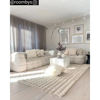 Dette produkt hedder Rabbit Bubble, fremstillet af Polyester materiale med en smuk Lys Beige farve - SE Mattor