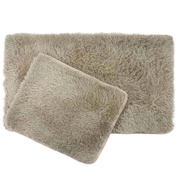 Dette produkt hedder Julie, fremstillet af Polyester materiale med en smuk Beige farve - SE Mattor