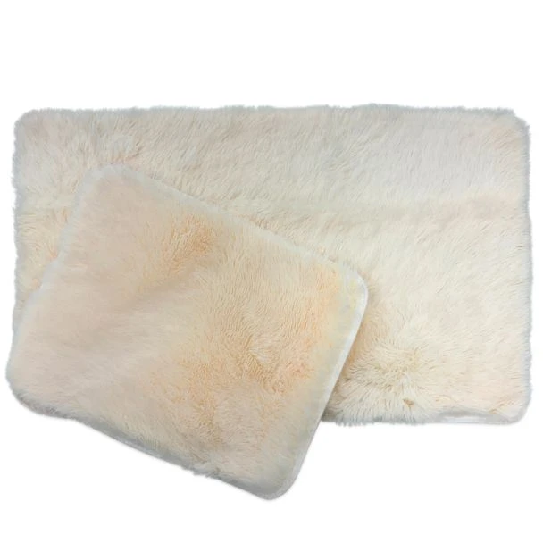 Dette produkt hedder Julie, fremstillet af Polyester materiale med en smuk Offwhite farve - SE Mattor
