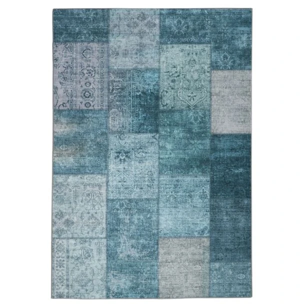 Dette produkt hedder Vero Flora, fremstillet af Polyester materiale med en smuk Blå farve - SE Mattor
