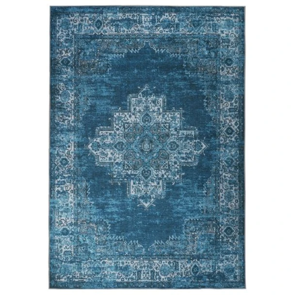 Dette produkt hedder Vero Rest, fremstillet af Polyester materiale med en smuk Blå farve - SE Mattor
